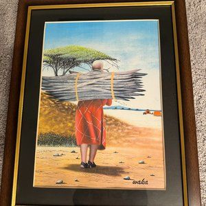 Maasai woman carrying firewood